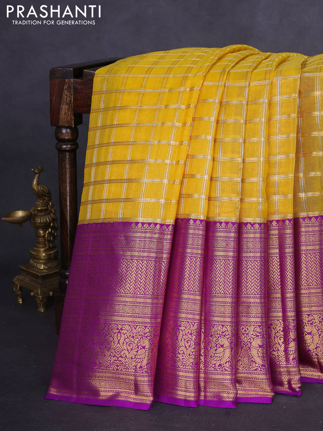 Kora kanchipuram silk saree mustard yellow and purple with silver & gold zari woven buttas and long zari woven border