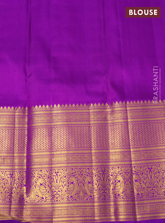 Kora kanchipuram silk saree mustard yellow and purple with silver & gold zari woven buttas and long zari woven border