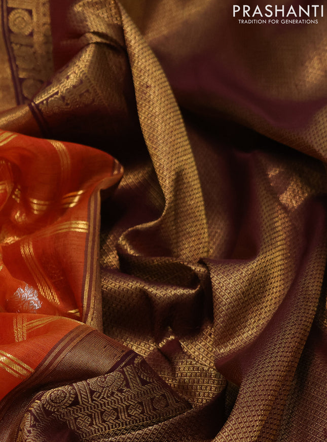 Kora kanchipuram silk saree orange and coffee brown with allover zari checks & buttas and long zari woven border
