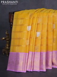 Kora kanchipuram silk saree mustard yellow and lavender with allover zari checks & buttas and zari woven border