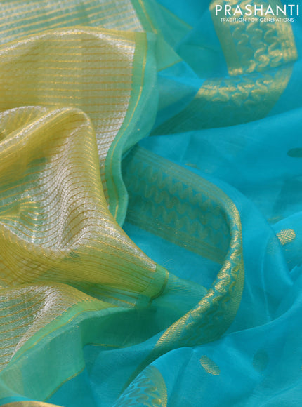 Kora kanchipuram silk saree pale yellow and teal blue with allover zari stripes pattern and zari woven butta border