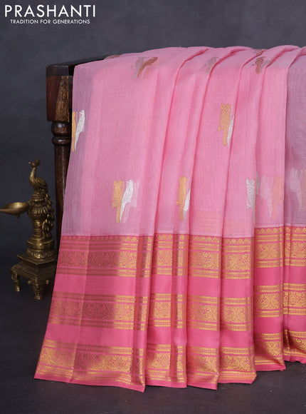 Kora kanchipuram silk saree mild peach pink and peach pink with silver & gold zari woven buttas and long zari woven border