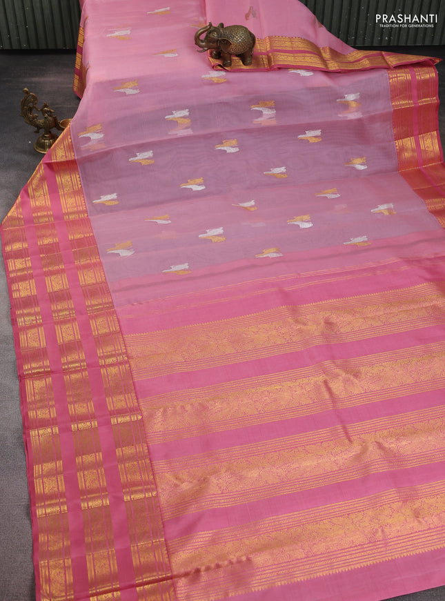Kora kanchipuram silk saree mild peach pink and peach pink with silver & gold zari woven buttas and long zari woven border