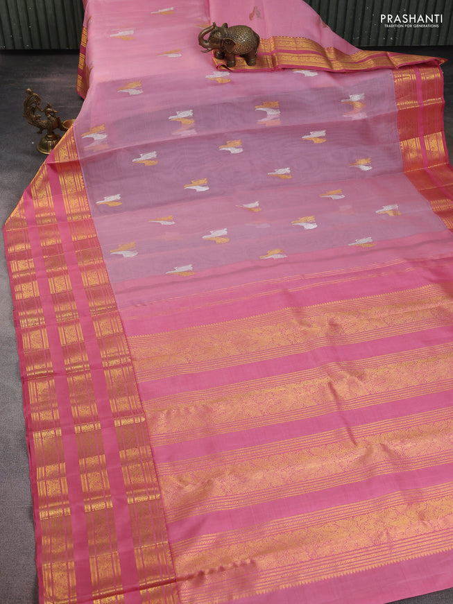 Kora kanchipuram silk saree mild peach pink and peach pink with silver & gold zari woven buttas and long zari woven border