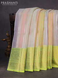 Kora kanchipuram silk saree multi colour and light green with allover silver zari stripes pattern and zari woven border