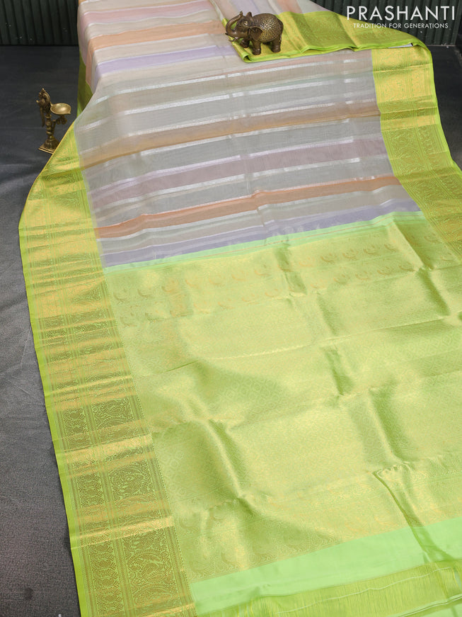 Kora kanchipuram silk saree multi colour and light green with allover silver zari stripes pattern and zari woven border