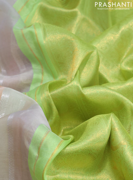 Kora kanchipuram silk saree multi colour and light green with allover silver zari stripes pattern and zari woven border