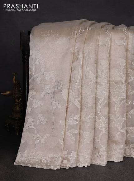 Pure tissue silk saree beige with applique work and scallop border