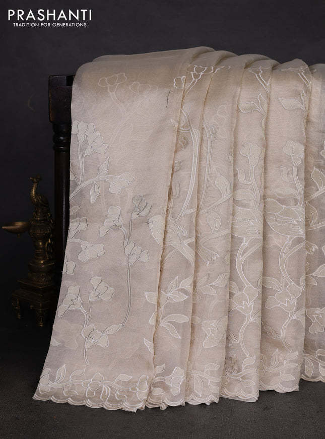 Pure tissue silk saree beige with applique work and scallop border