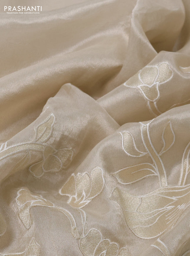 Pure tissue silk saree beige with applique work and scallop border