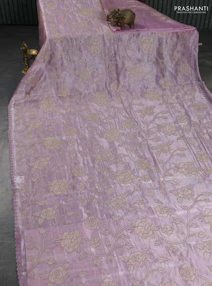 Pure tissue silk saree pastel pink with allover floral embroidery applique work and embroidery scallop border