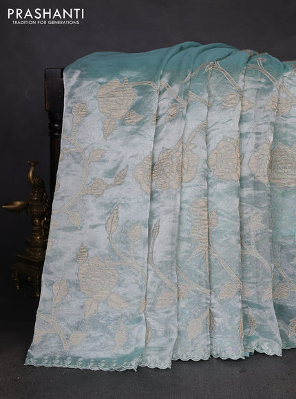 Pure tissue silk saree teal blue with allover floral embroidery applique work and embroidery scallop border