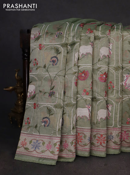 Pure tissue silk saree pastel green with allover pichwai embroidery work and embroidery border