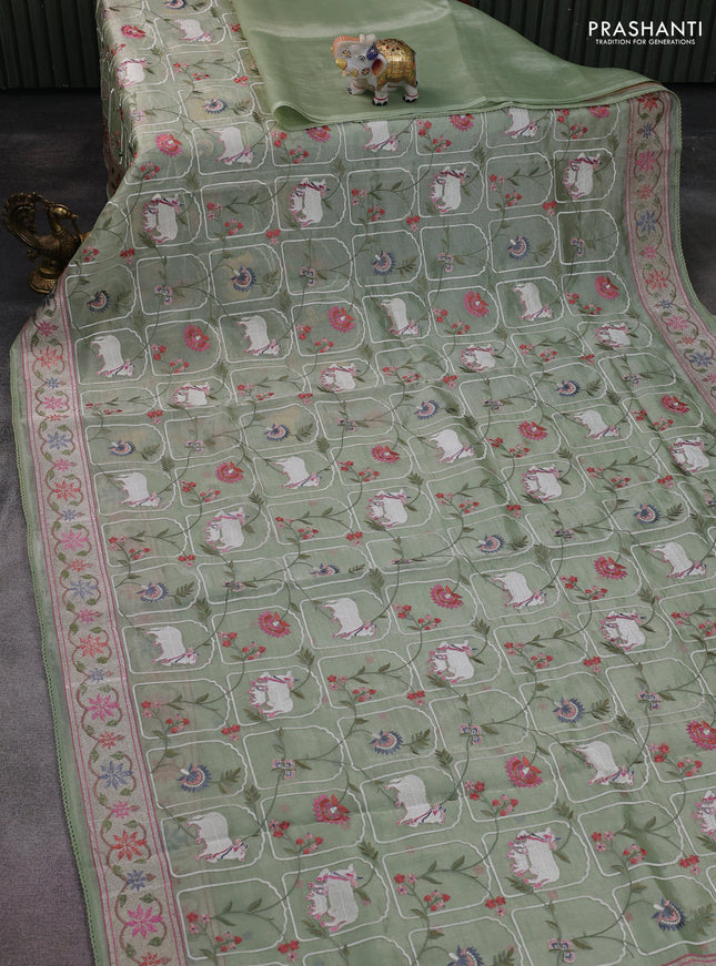 Pure tissue silk saree pastel green with allover pichwai embroidery work and embroidery border