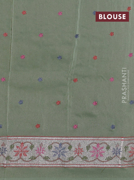 Pure tissue silk saree pastel green with allover pichwai embroidery work and embroidery border