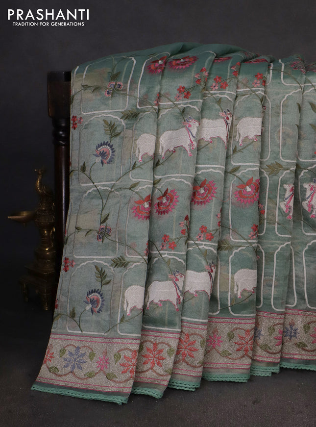 Pure tissue silk saree pista green shade with allover pichwai embroidery work and embroidery border