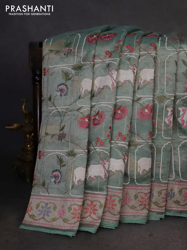 Pure tissue silk saree pista green shade with allover pichwai embroidery work and embroidery border