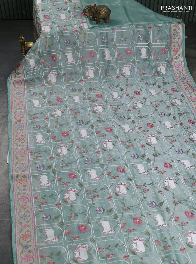 Pure tissue silk saree pista green shade with allover pichwai embroidery work and embroidery border