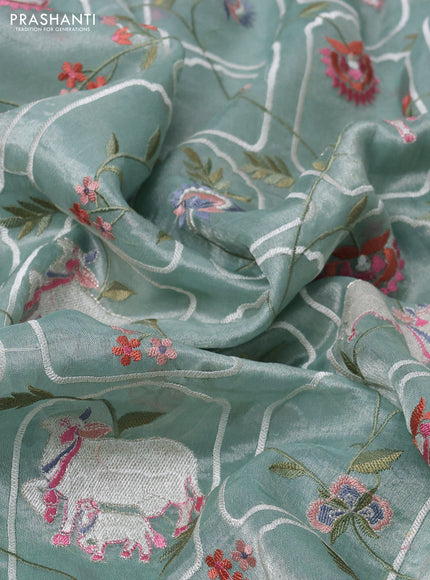 Pure tissue silk saree pista green shade with allover pichwai embroidery work and embroidery border