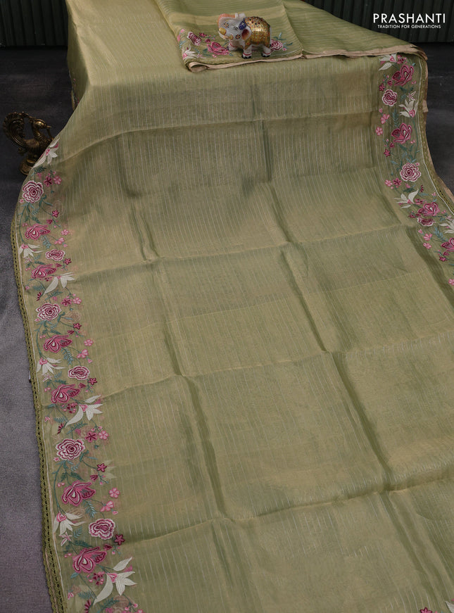 Pure tissue silk saree pastel green with allover zari stripe pattern and covent embroidery border