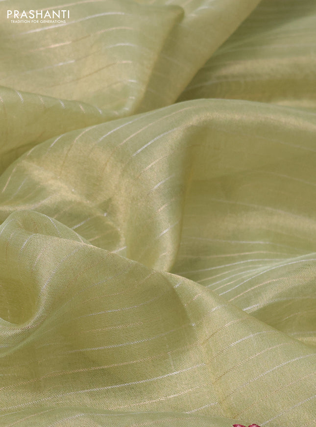 Pure tissue silk saree pastel green with allover zari stripe pattern and covent embroidery border