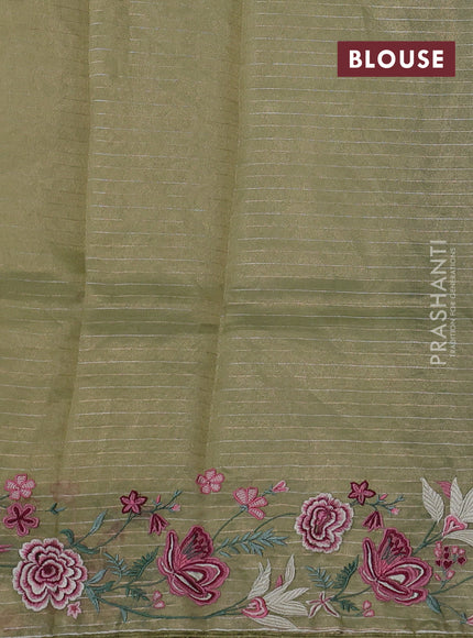 Pure tissue silk saree pastel green with allover zari stripe pattern and covent embroidery border