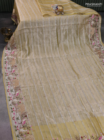 Pure tissue silk saree pale yellow with allover silver zari strip pattern & beaded work and embroidery border