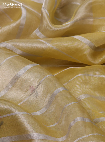Pure tissue silk saree pale yellow with allover silver zari strip pattern & beaded work and embroidery border