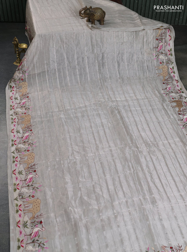 Pure tissue silk saree pastel grey with allover silver zari strip pattern & beaded work and embroidery border