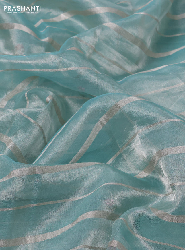 Pure tissue silk saree teal blue with allover silver zari strip pattern & beaded work and embroidery border