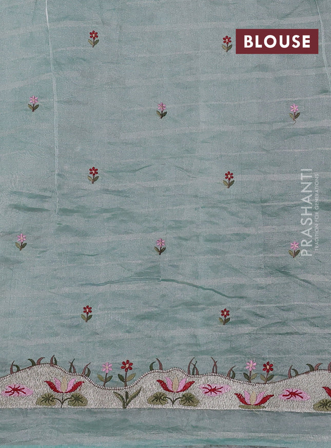 Pure tissue silk saree teal blue with allover silver zari strip pattern & beaded work and embroidery border