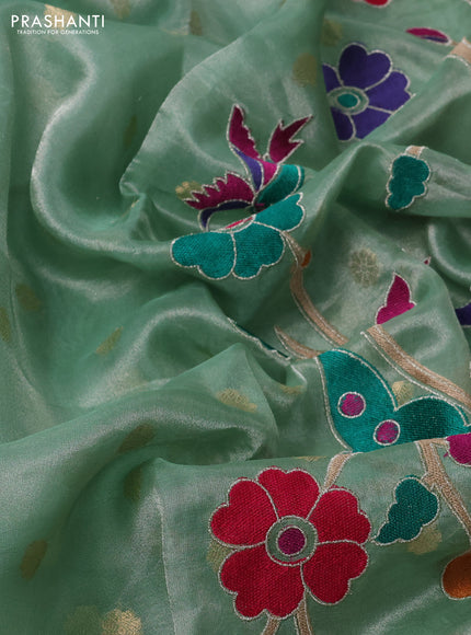 Pure tissue silk saree teal green shade with allover zari woven buttas and zari woven border