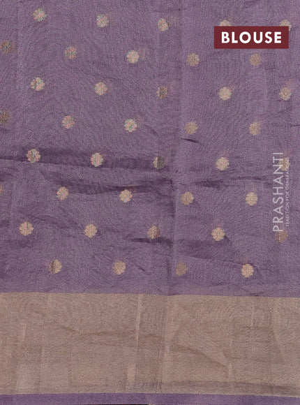 Pure tissue silk saree mild purple with allover zari woven buttas and zari woven border