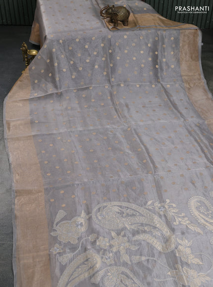 Pure tissue silk saree grey with allover zari woven buttas and zari woven border