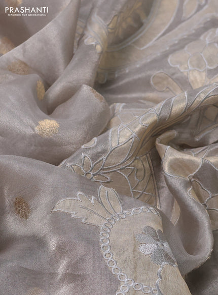 Pure tissue silk saree grey with allover zari woven buttas and zari woven border