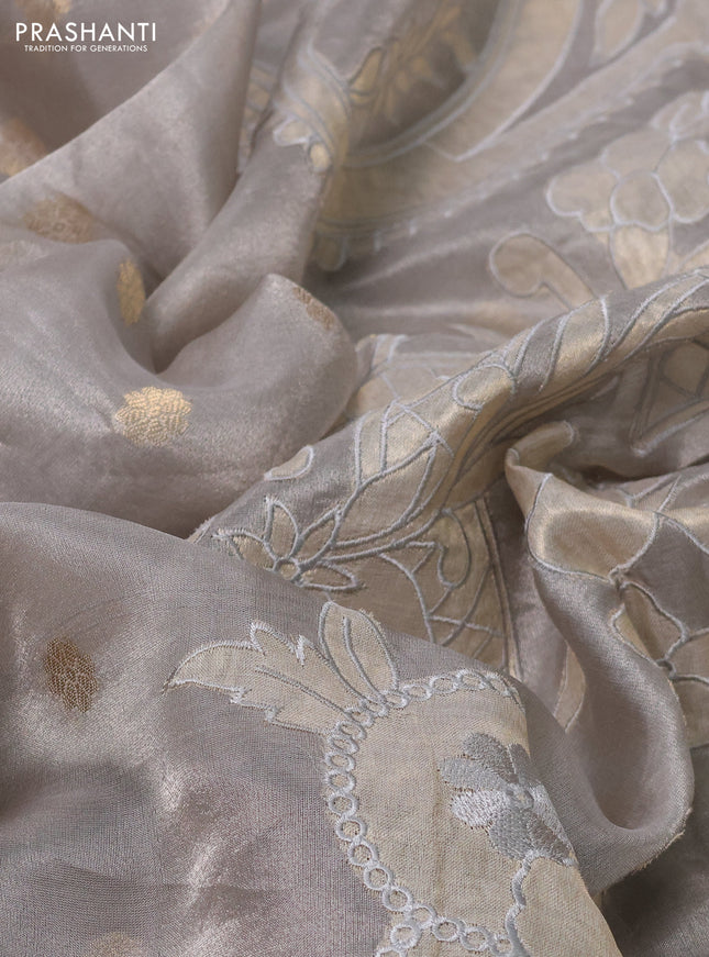 Pure tissue silk saree grey with allover zari woven buttas and zari woven border