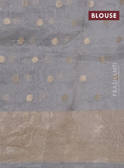 Pure tissue silk saree grey with allover zari woven buttas and zari woven border
