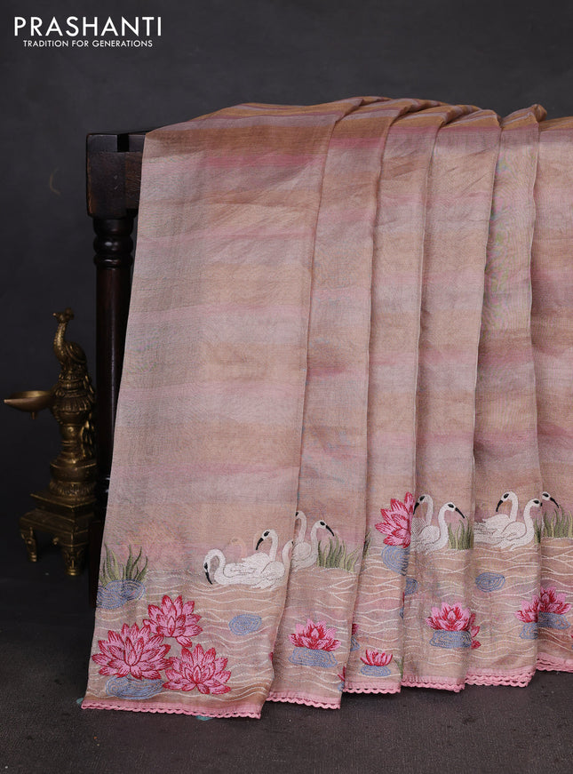 Pure tissue silk saree pastel peach with allover stripe pattern and embroidery border