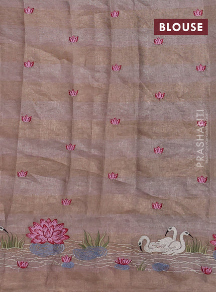 Pure tissue silk saree pastel peach with allover stripe pattern and embroidery border