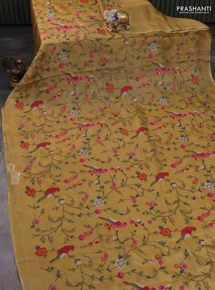 Pure tissue silk saree gold with allover convent embroidery work and simple border