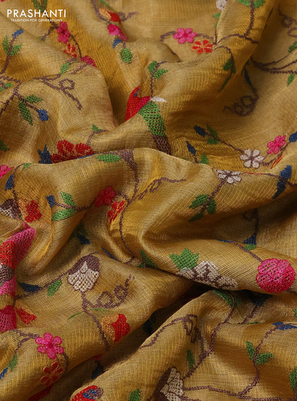 Pure tissue silk saree gold with allover convent embroidery work and simple border