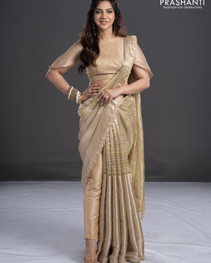 Pure tissue silk saree beige with Half & half style zari weaves and beaded work border