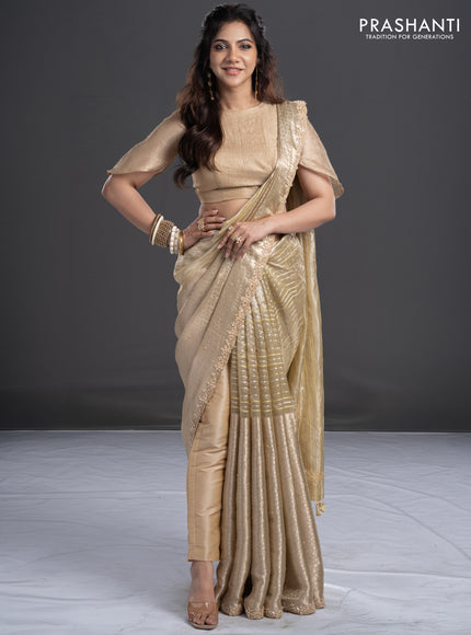 Pure tissue silk saree beige with Half & half style zari weaves and beaded work border