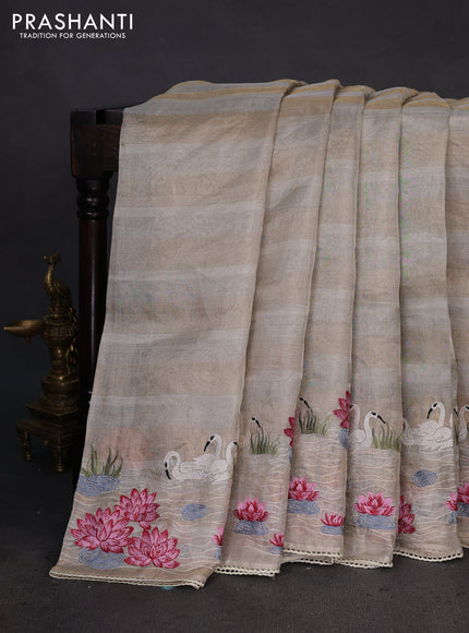 Pure tissue silk saree beige with allover stripe pattern and embroidery border