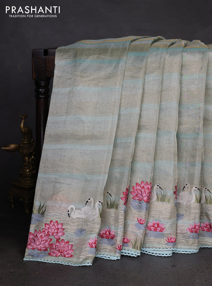 Pure tissue silk saree pastel blue with allover stripe pattern and embroidery border