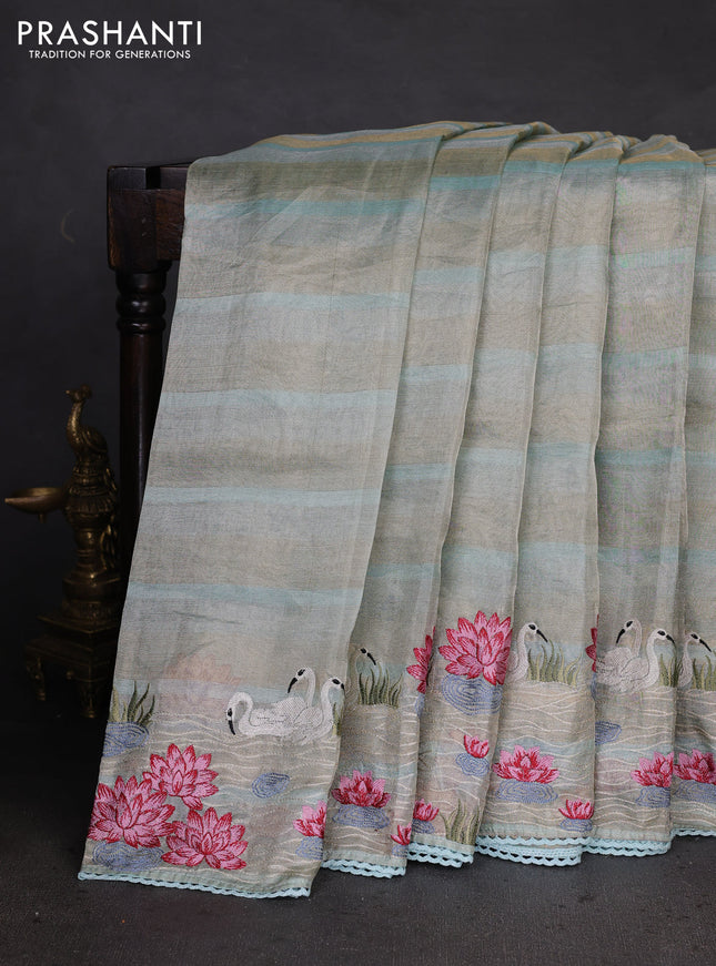 Pure tissue silk saree pastel blue with allover stripe pattern and embroidery border