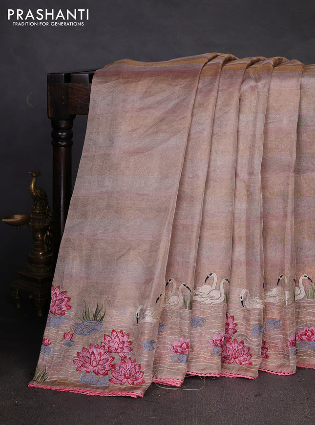 Pure tissue silk saree pastel peach pink with allover stripe pattern and embroidery border