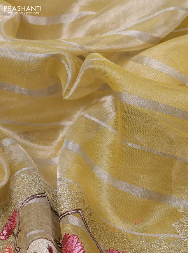 Pure tissue silk saree pale yellow with allover silver zari strip pattern & beaded work and pichwai embroidery border