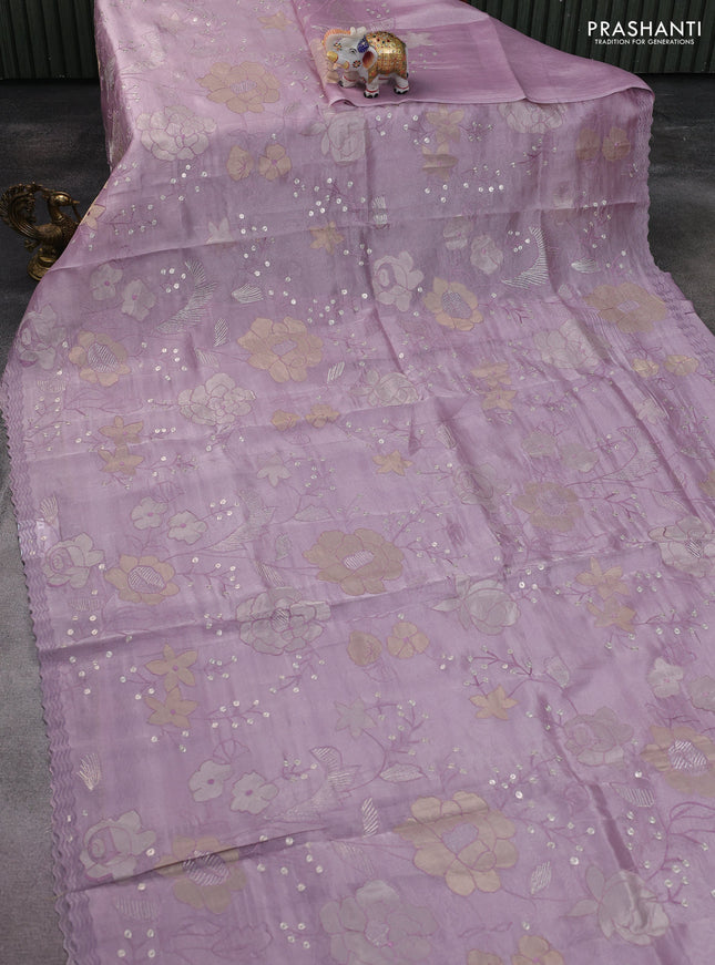 Pure tissue silk saree lavender with allover floral embroidery work and simple embroidery border