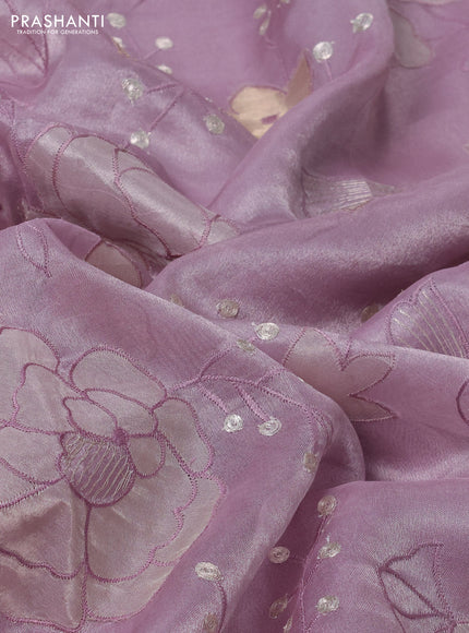 Pure tissue silk saree lavender with allover floral embroidery work and simple embroidery border